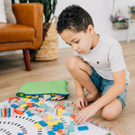 Child playing with wooden toy 