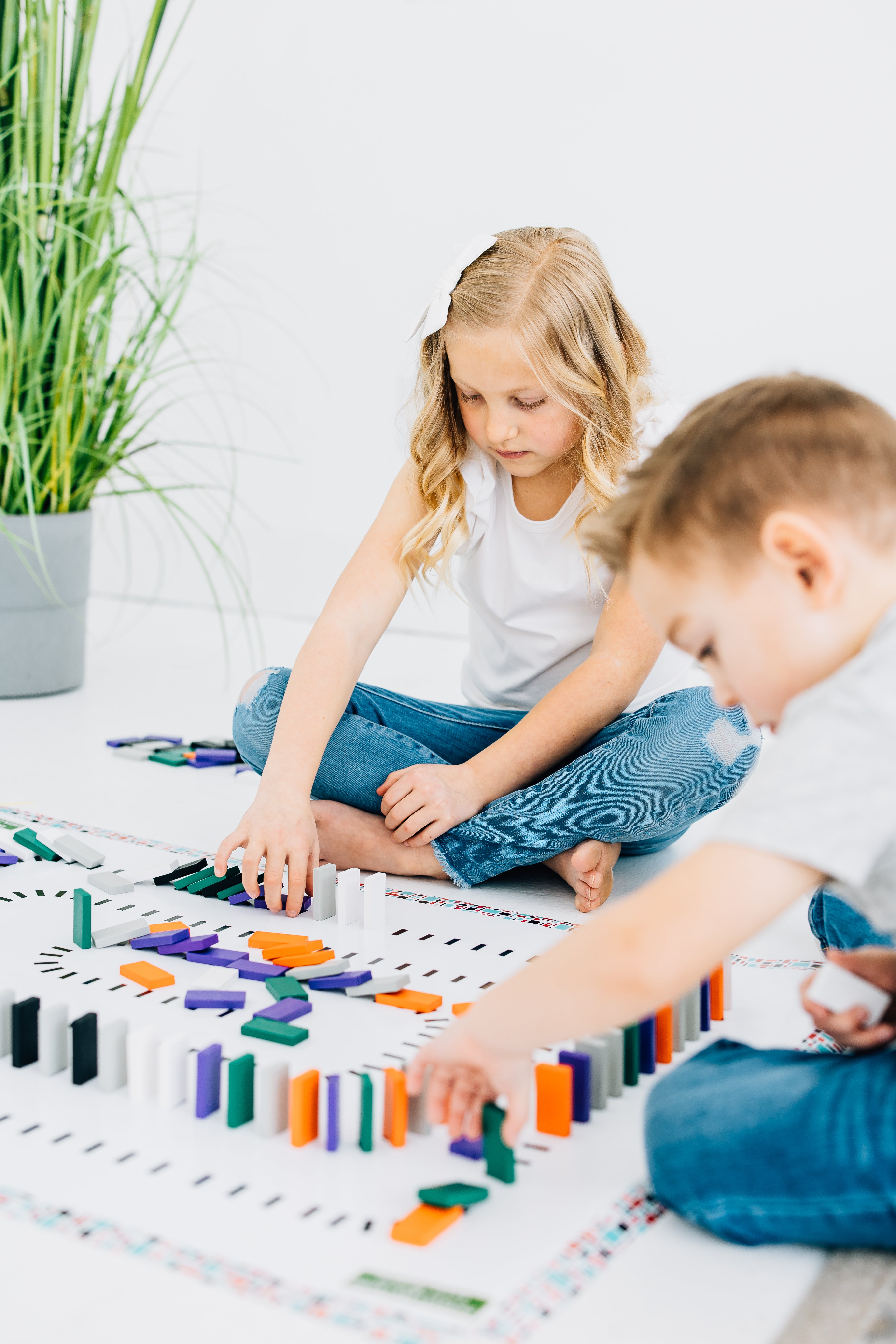 Children playing a fine motor skills game together. 